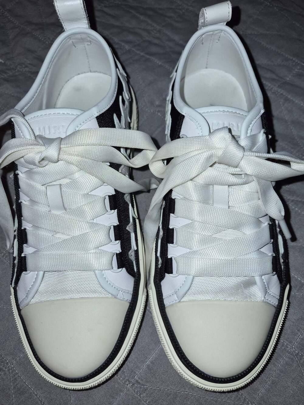 Amiri Skel Top Stars Court Low-Top Sneakers in Black and White